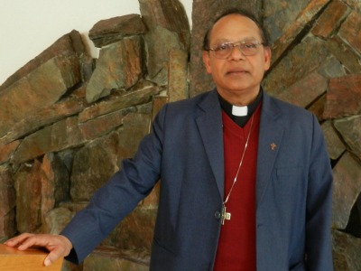 Prtraitbild von Reverend Dr. George Melel, Pastor der Indischen Gemeinde Krefeld